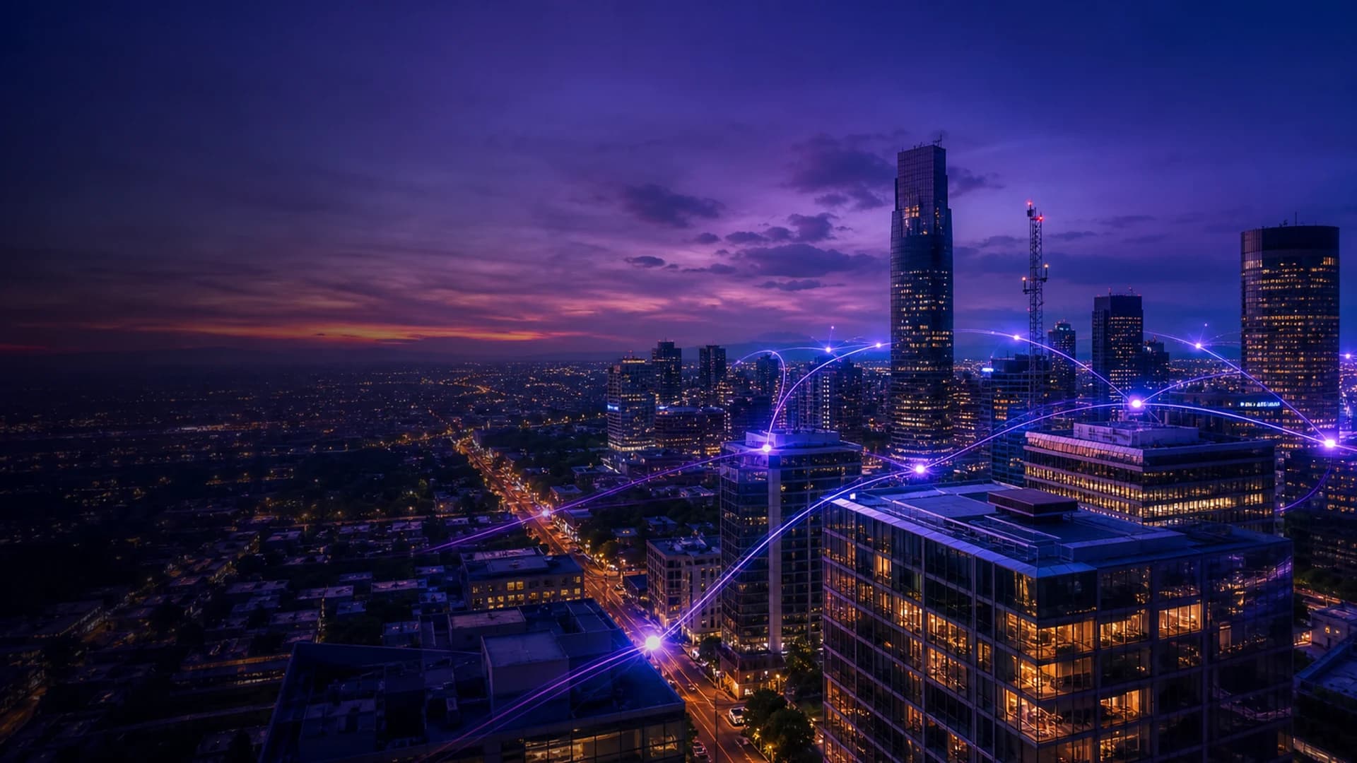 Vista aérea de una ciudad al atardecer, con arcos de luz violeta uniendo las torres.